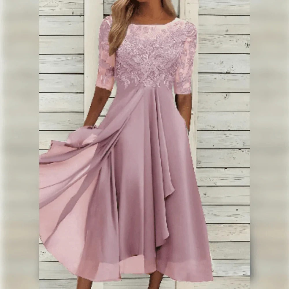 Vestido midi elegante con detalle de encaje y falda fluida para ocasiones especiales