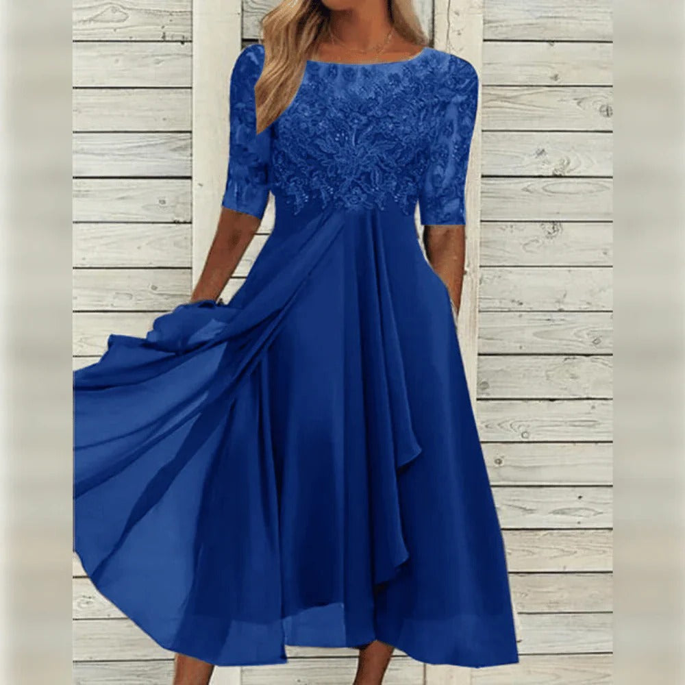 Vestido midi elegante con detalle de encaje y falda fluida para ocasiones especiales