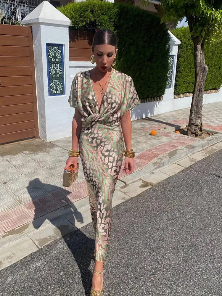 Vestido midi elegante para mujer con escote en V y detalle de nudo