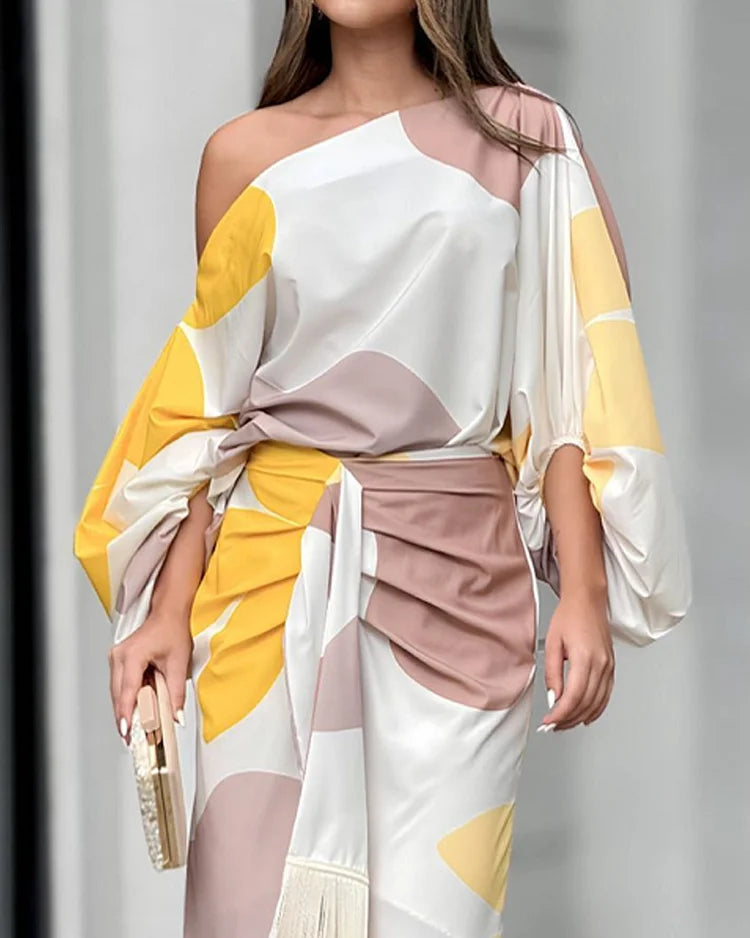 Vestido midi envolvente asimétrico con flecos