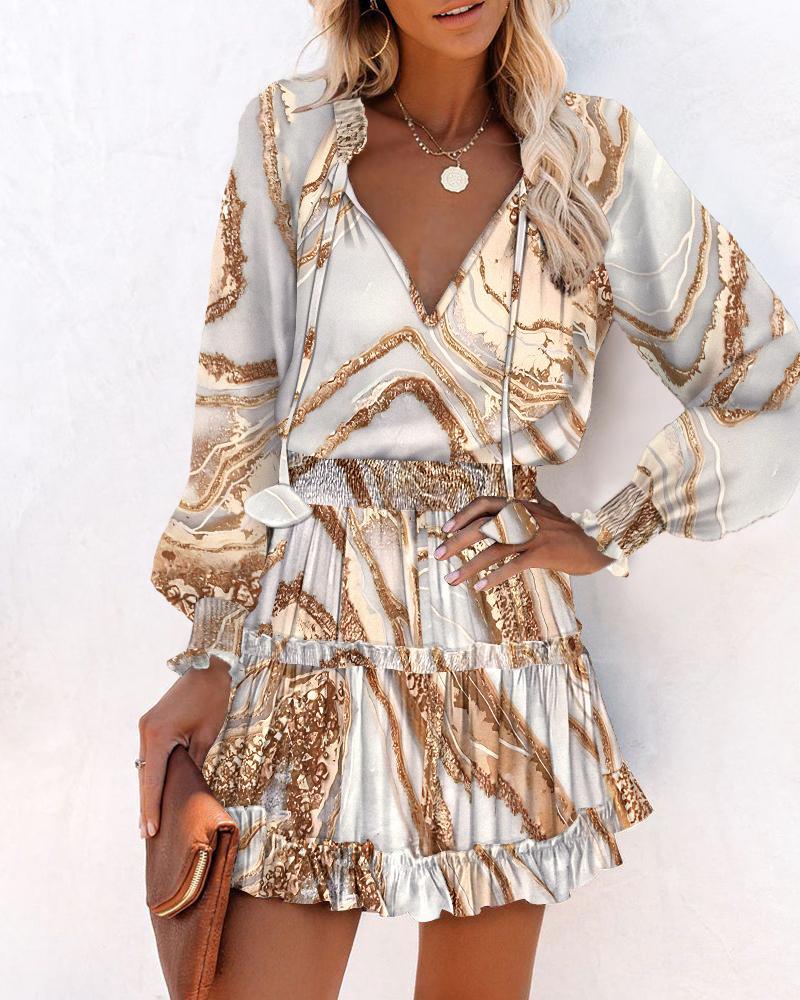Vestido mini estampado con mangas largas