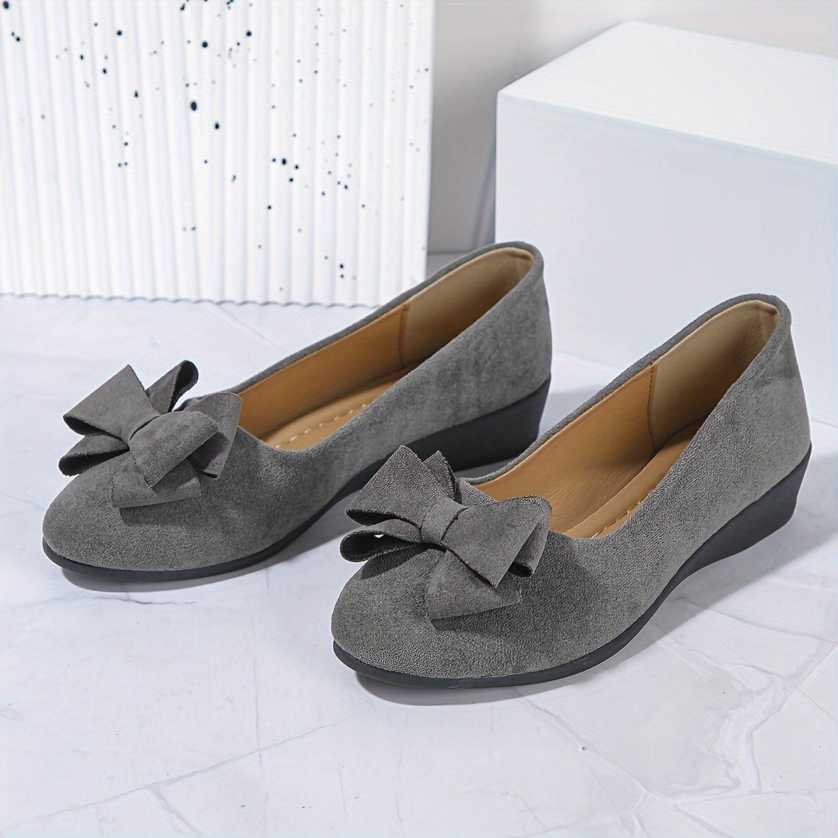 Zapatos de cuña con lazo