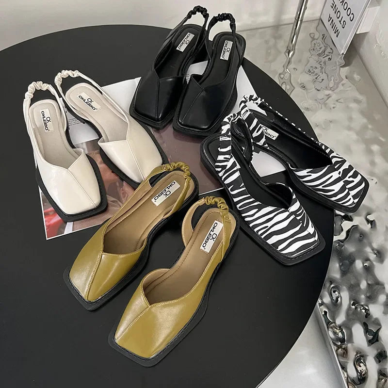 Zapatos destalonados de puntera cuadrada