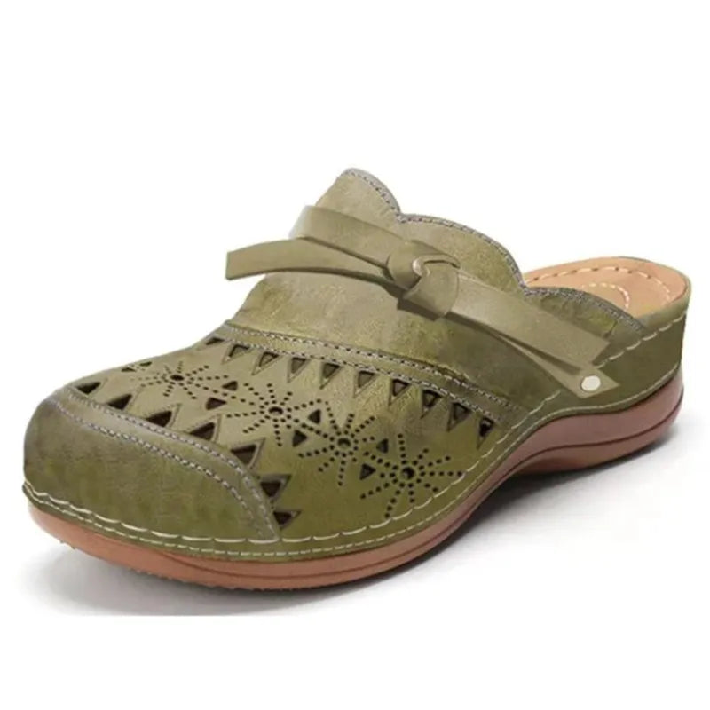 Zuecos sin cordones calados con detalle de lazo para mujer