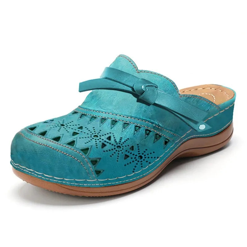Zuecos sin cordones calados con detalle de lazo para mujer